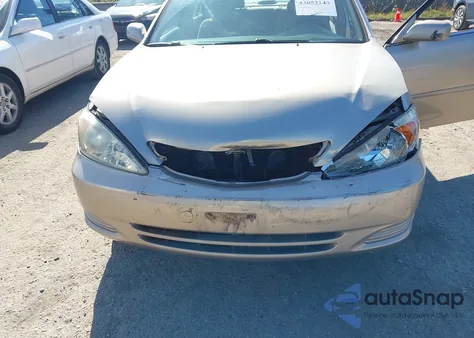 2002 Toyota Camry Le z USA, uszkodzony, nr VIN 4T1BE32K82U534669